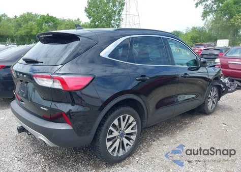 2021 Ford Escape Titanium z USA, uszkodzony, nr VIN 1FMCU9J97MUA77753